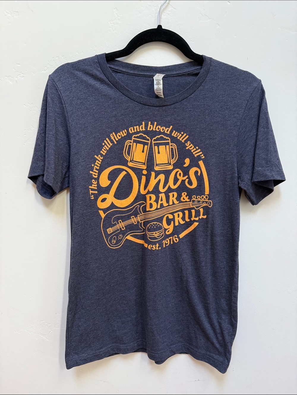 Canvas Navy Graphic Tee with Orange Dino's Bar & Grill Design
